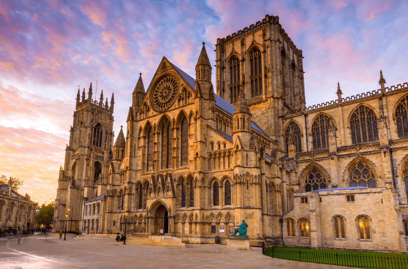 A dog sitting near York Minster